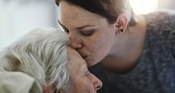 Shot of a daughter visiting her senior mother in hospital