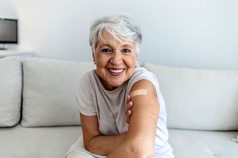 A senior woman has received a Leqembi injection at home, a recent Alzheimer’s medication advancement that is improving health and quality of life for those with dementia.